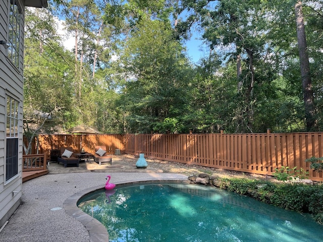 3 Candle Pine Pl, The Woodlands, TX 77381 - view of swimming pool with a fenced backyard and a patio area