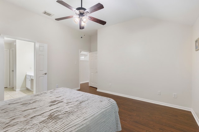 38 Florian Ct, Conroe, TX 77385 - bedroom featuring lofted ceiling, wood finished floors, baseboards, and ceiling fan
