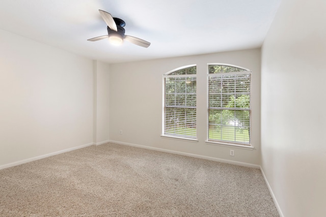 38 Florian Ct, Conroe, TX 77385 - unfurnished room featuring ceiling fan, healthy amount of natural light, and carpet