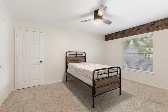 38 Florian Ct, Conroe, TX 77385 - bedroom with carpet floors, a ceiling fan, and baseboards