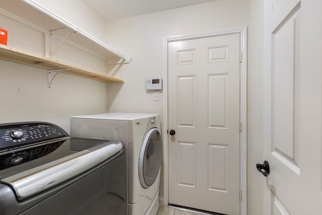 38 Florian Ct, Conroe, TX 77385 - laundry area featuring washing machine and clothes dryer