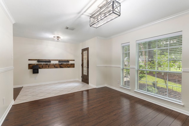 38 Florian Ct, Conroe, TX 77385 - unfurnished room featuring hardwood / wood-style floors, healthy amount of natural light, crown molding, and baseboards