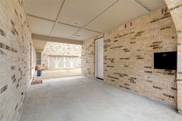 17215 Astrachan Rd, Richmond, TX 77407 - view of patio / terrace featuring a garage