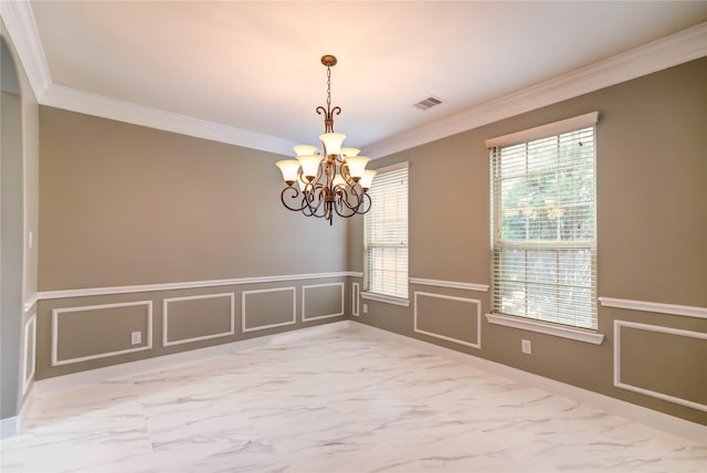 17215 Astrachan Rd, Richmond, TX 77407 - unfurnished room with a chandelier, crown molding, marble finish flooring, a wainscoted wall, and a decorative wall