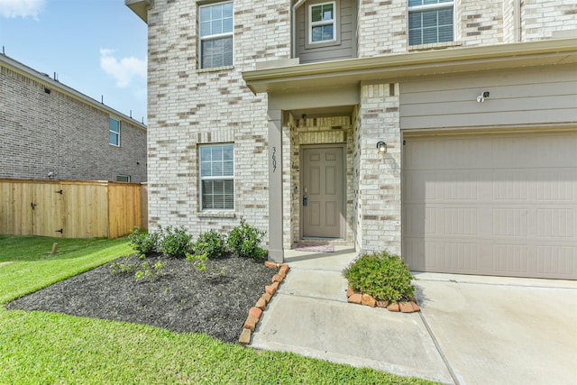 3607 Crosspointe Pass, Angleton, TX 77515 - doorway to property with an attached garage and concrete driveway