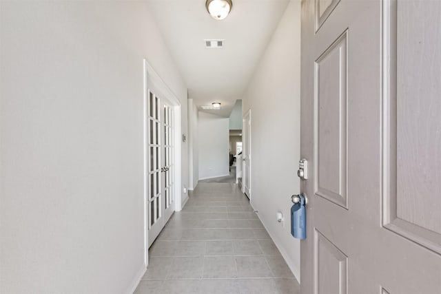 3607 Crosspointe Pass, Angleton, TX 77515 - hallway featuring light tile patterned floors and baseboards