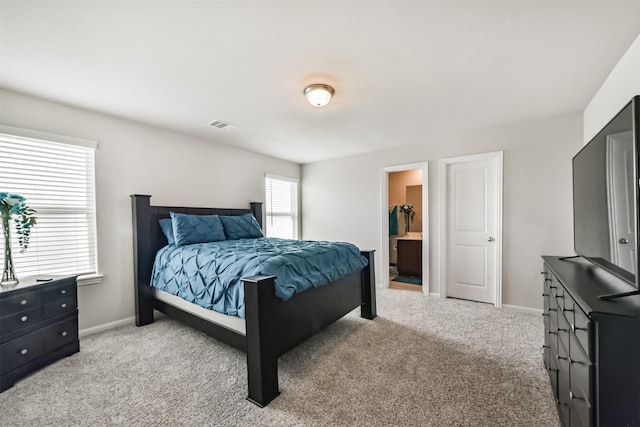 3607 Crosspointe Pass, Angleton, TX 77515 - bedroom with light carpet and baseboards