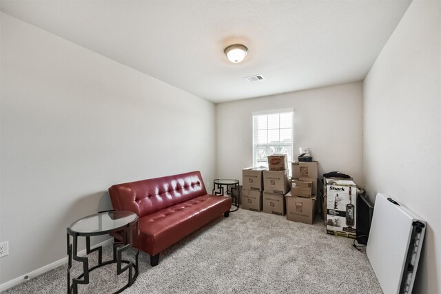 3607 Crosspointe Pass, Angleton, TX 77515 - living area with carpet flooring and baseboards