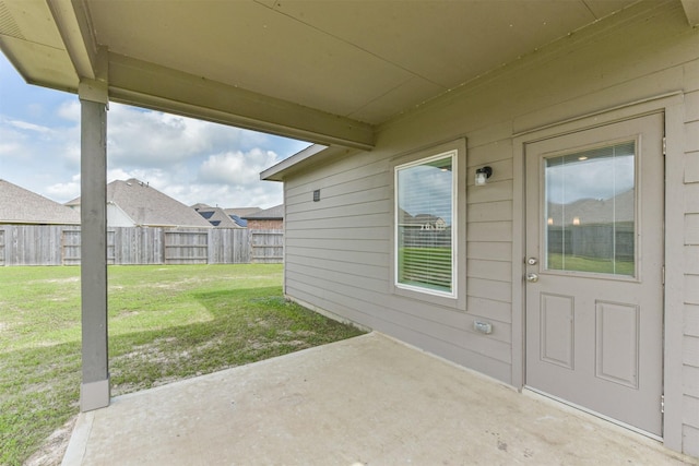 3607 Crosspointe Pass, Angleton, TX 77515 - view of exterior entry with a patio