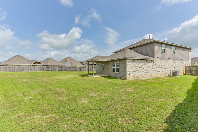 3607 Crosspointe Pass, Angleton, TX 77515 - view of yard with central AC unit and a patio