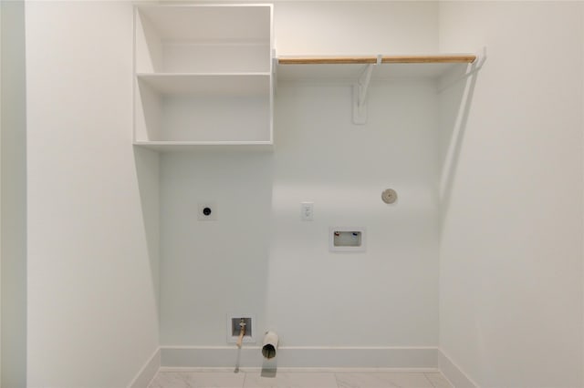 4043 Buck St, Houston, TX 77020 - washroom with hookup for a gas dryer, electric dryer hookup, hookup for a washing machine, and baseboards