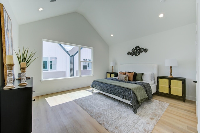 4043 Buck St, Houston, TX 77020 - bedroom with lofted ceiling, light wood finished floors, recessed lighting, and baseboards