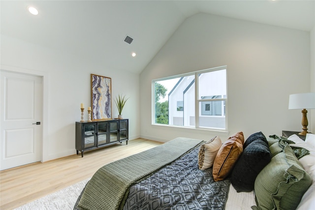 4043 Buck St, Houston, TX 77020 - bedroom featuring wood finished floors, lofted ceiling, and recessed lighting