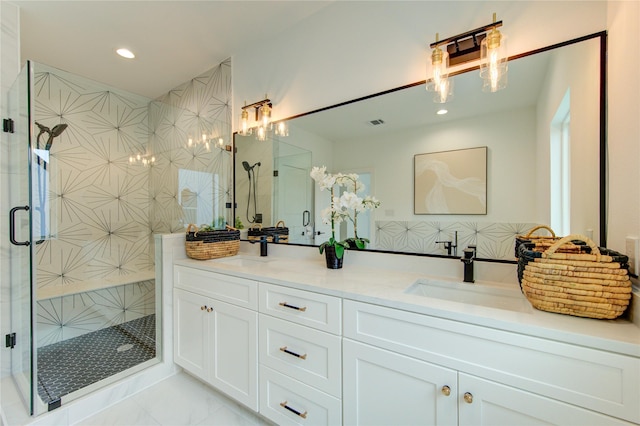 4043 Buck St, Houston, TX 77020 - full bath with a chandelier, double vanity, a shower stall, and recessed lighting