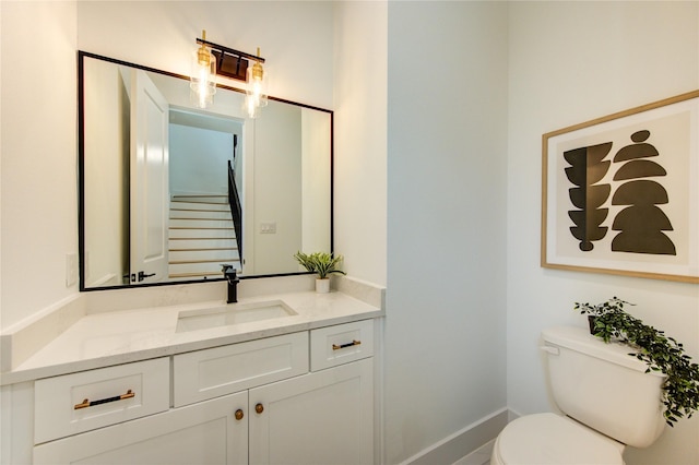 4043 Buck St, Houston, TX 77020 - half bathroom with toilet, vanity, and baseboards