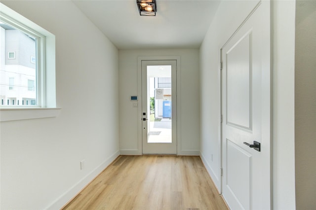 4043 Buck St, Houston, TX 77020 - entryway featuring light wood finished floors and baseboards