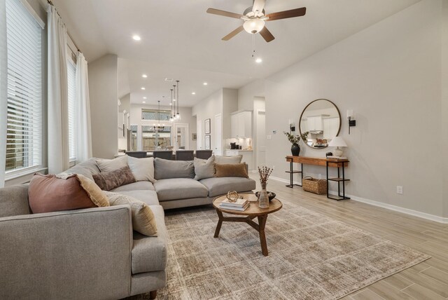 29639 Mahogany View Ln, Fulshear, TX 77441 - living room featuring a ceiling fan, light wood-style flooring, recessed lighting, and baseboards