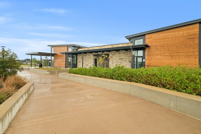 29639 Mahogany View Ln, Fulshear, TX 77441 - view of home's exterior featuring brick siding