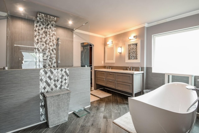 7926 Millers Way, Houston, TX 77095 - bathroom with a freestanding tub, double vanity, wood finished floors, crown molding, and a walk in shower