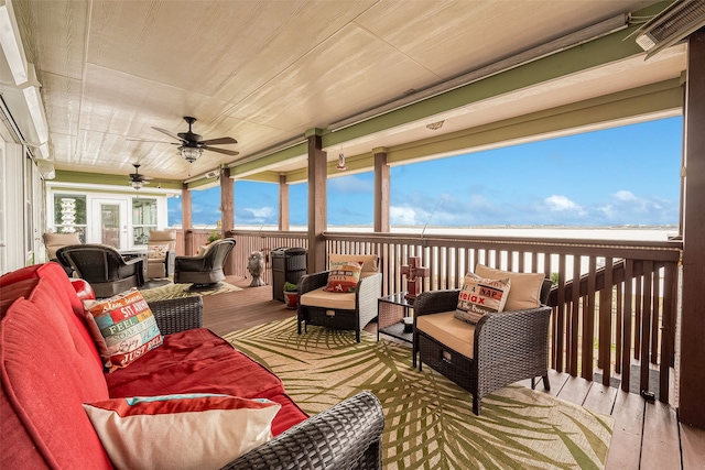 792 W Bayshore Dr, Palacios, TX 77465 - deck with outdoor lounge area and a ceiling fan