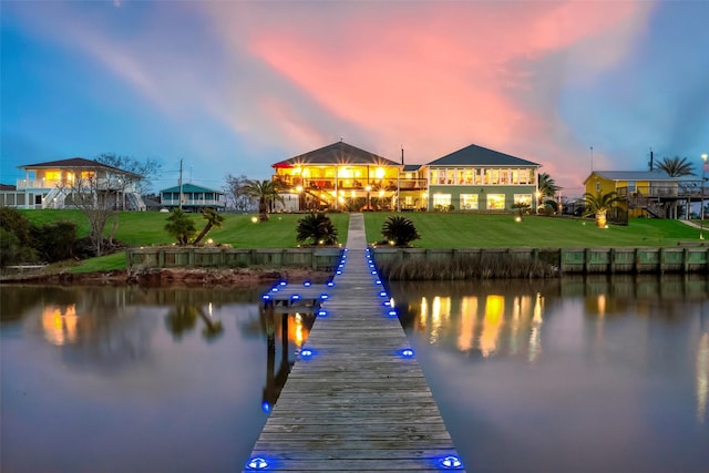 792 W Bayshore Dr, Palacios, TX 77465 - dock area with a water view and a lawn