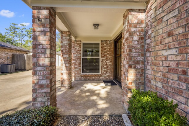 12114 Knobcrest Dr, Houston, TX 77070 - entrance to property with brick siding and central air condition unit
