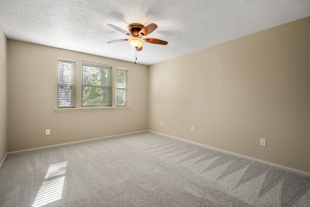 12114 Knobcrest Dr, Houston, TX 77070 - carpeted spare room with ceiling fan, a textured ceiling, and baseboards