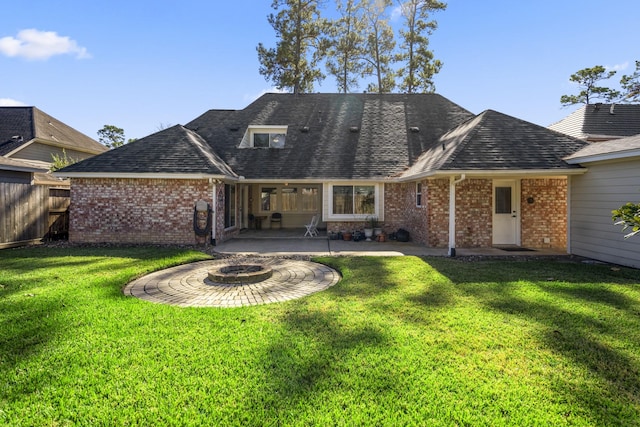 12114 Knobcrest Dr, Houston, TX 77070 - back of property with brick siding, a fire pit, a patio area, and roof with shingles