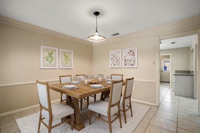 12114 Knobcrest Dr, Houston, TX 77070 - dining room with light tile patterned floors and baseboards