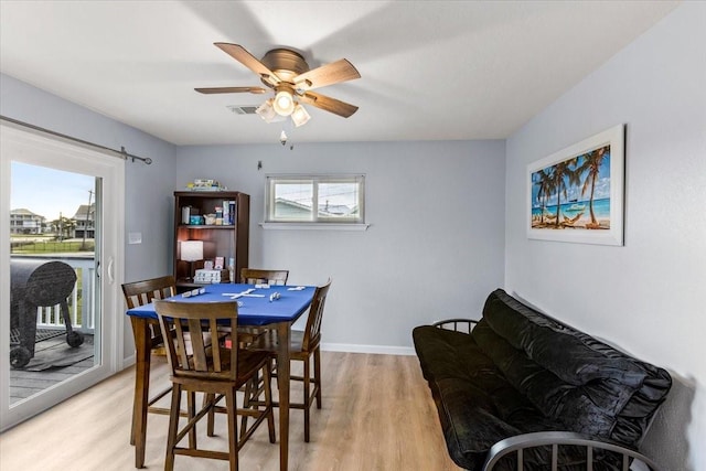 4220 Las Palmas St, Galveston, TX 77554 - dining space with light wood-style flooring and ceiling fan