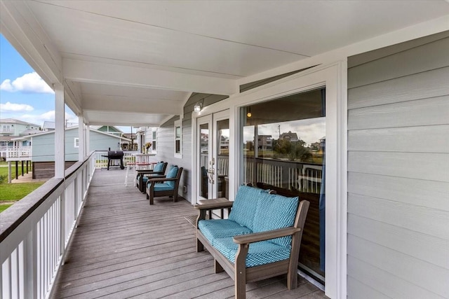 4220 Las Palmas St, Galveston, TX 77554 - wooden terrace with french doors