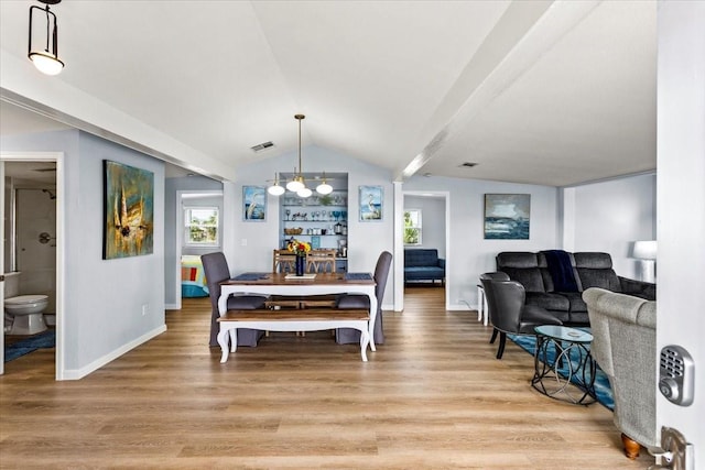 4220 Las Palmas St, Galveston, TX 77554 - dining area featuring lofted ceiling and light wood-type flooring