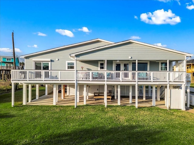 4220 Las Palmas St, Galveston, TX 77554 - back of property with a patio area, a wooden deck, a yard, and stairway