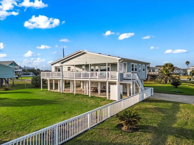 4220 Las Palmas St, Galveston, TX 77554 - rear view of property with stairs, a fenced backyard, a deck, and a residential view