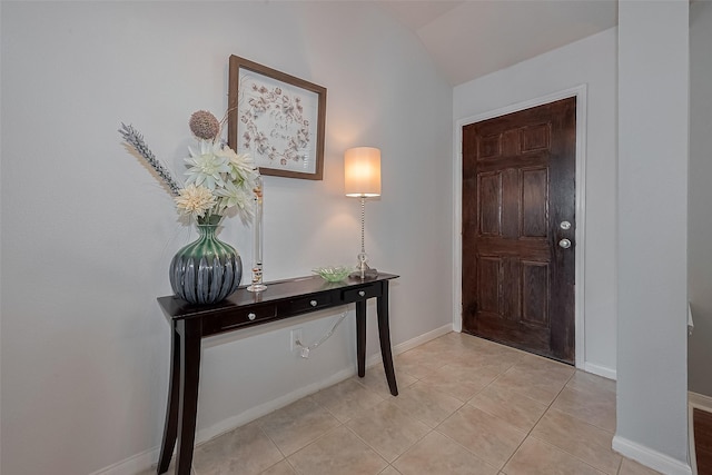 11826 Balmorhea Ln, Sugar Land, TX 77498 - entryway with baseboards, lofted ceiling, and light tile patterned flooring