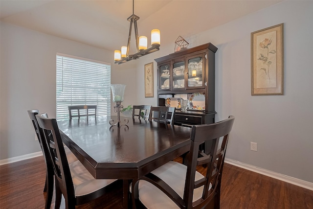 11826 Balmorhea Ln, Sugar Land, TX 77498 - dining area with a chandelier, baseboards, and dark wood-type flooring