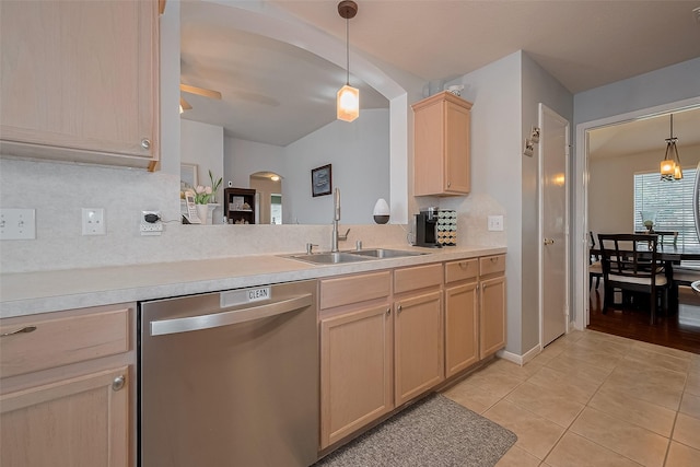 11826 Balmorhea Ln, Sugar Land, TX 77498 - kitchen featuring stainless steel dishwasher, a sink, light brown cabinets, arched walkways, and light tile patterned flooring