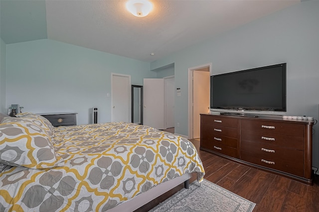 11826 Balmorhea Ln, Sugar Land, TX 77498 - bedroom featuring dark wood finished floors and vaulted ceiling