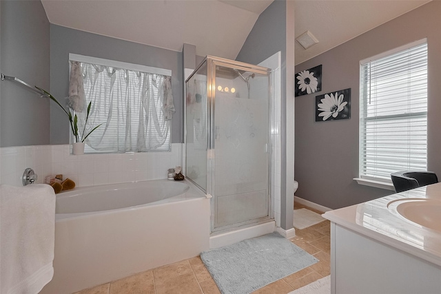 11826 Balmorhea Ln, Sugar Land, TX 77498 - bathroom featuring a garden tub, a stall shower, plenty of natural light, tile patterned flooring, and lofted ceiling