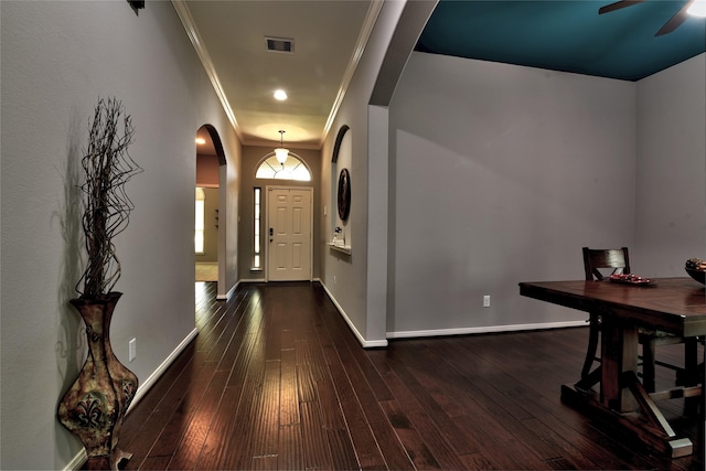 24302 Marisa Ln, Richmond, TX 77406 - foyer with arched walkways, ornamental molding, dark wood-style flooring, and ceiling fan