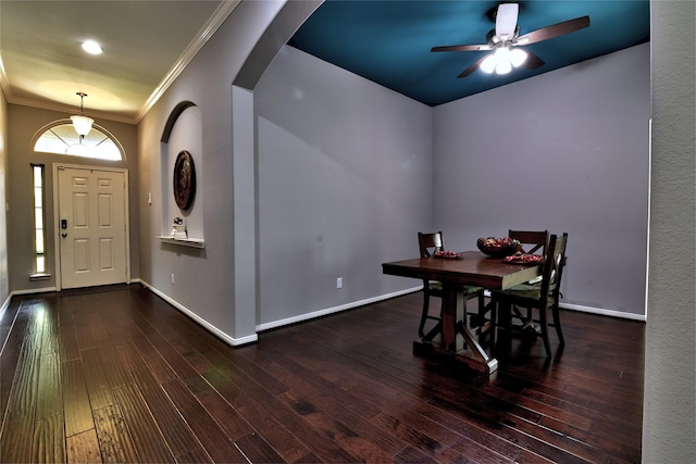 24302 Marisa Ln, Richmond, TX 77406 - dining area with hardwood / wood-style flooring, a ceiling fan, arched walkways, and ornamental molding