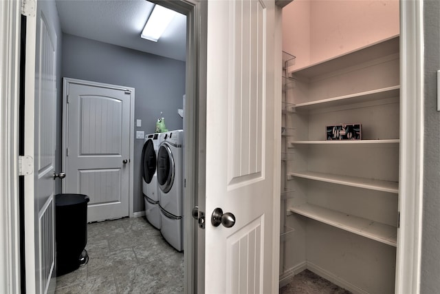 24302 Marisa Ln, Richmond, TX 77406 - laundry area with independent washer and dryer and baseboards