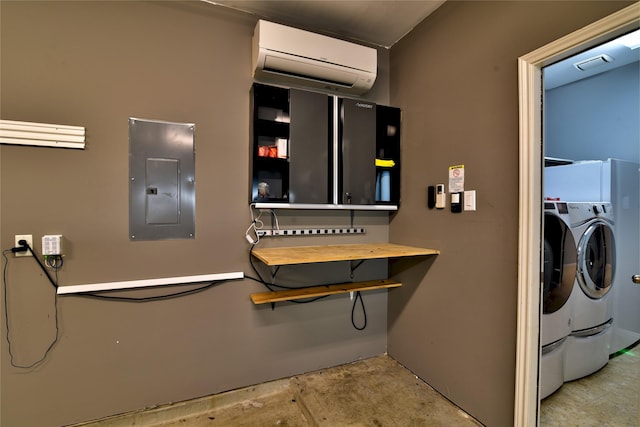 24302 Marisa Ln, Richmond, TX 77406 - washroom with a wall unit AC, electric panel, and washer and clothes dryer