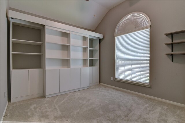 24302 Marisa Ln, Richmond, TX 77406 - empty room with carpet floors, lofted ceiling, and ceiling fan