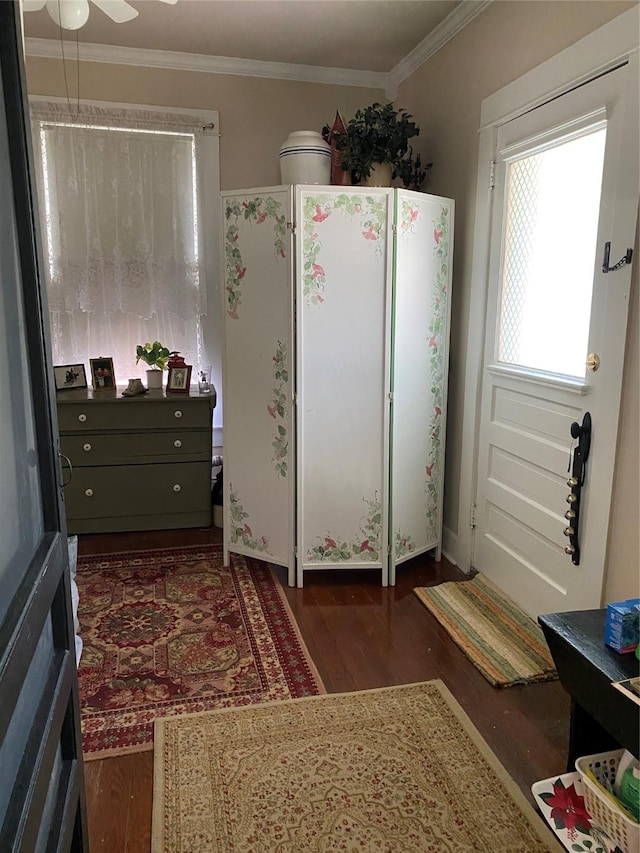 314 W Vulcan St, Brenham, TX 77833 - kitchen featuring wood finished floors, ornamental molding, freestanding refrigerator, and a ceiling fan