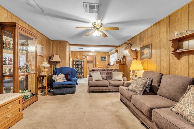 2015 Wakefield Dr, Houston, TX 77018 - living room featuring wooden walls, carpet flooring, and a ceiling fan