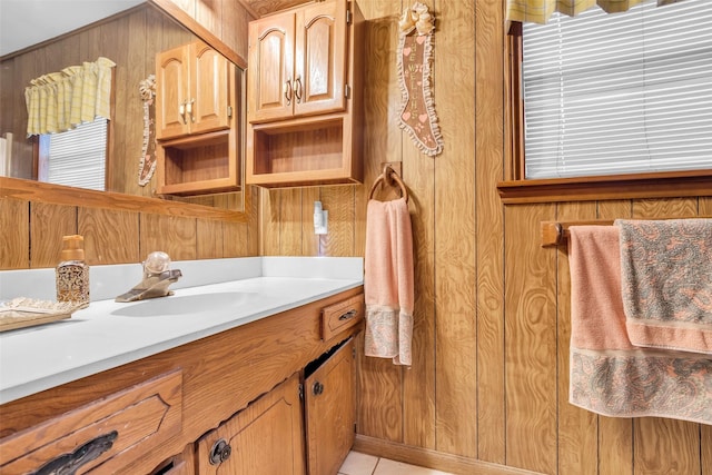 2015 Wakefield Dr, Houston, TX 77018 - bathroom featuring vanity, wooden walls, and tile patterned flooring