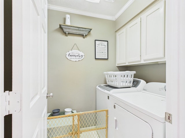 3707 Scenic Valley Dr, Kingwood, TX 77345 - laundry area with cabinet space, washing machine and clothes dryer, and ornamental molding