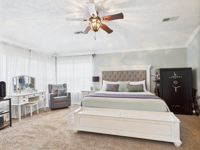 3707 Scenic Valley Dr, Kingwood, TX 77345 - carpeted bedroom featuring a textured ceiling, crown molding, and ceiling fan