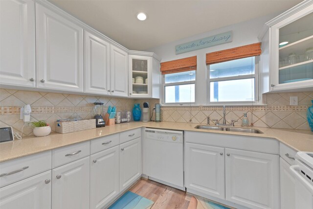 4003 Indian Beach Dr, Galveston, TX 77554 - kitchen with white appliances, a sink, white cabinetry, recessed lighting, and light countertops